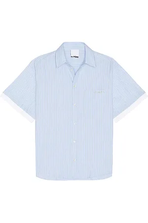 REVOLVE Le Père Le père camisa botones le pre double short sleeve en color azul talla L en - Blue. Talla L (también en M, S, XL/1X).