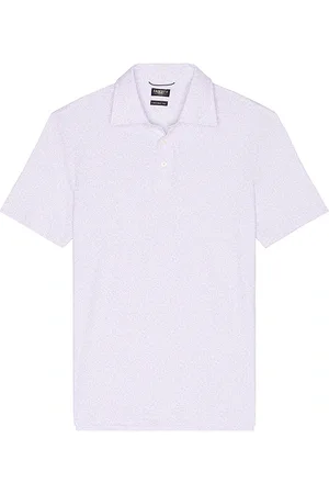 REVOLVE Faherty Faherty short sleeve movement pique polo en color rosado talla S en - Pink. Talla S (también en ).