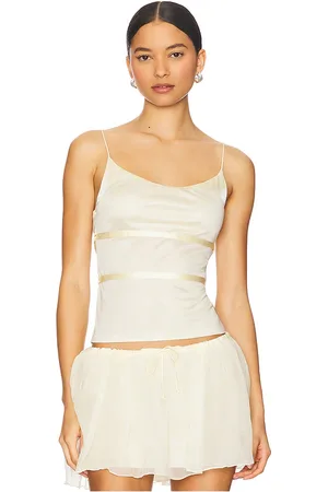 REVOLVE BUCI Buci top sin mangas thistle en color crema talla L en - Cream. Talla L (también en S).