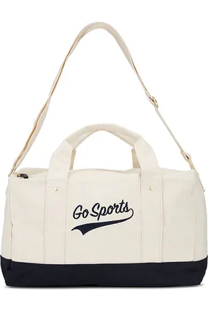 REVOLVE Favorite Daughter Favorite daughter bolsa fácil de transportar go sports en color crema talla all en - Cream. Talla all.