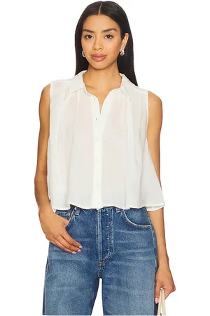 REVOLVE Citizens of Humanity Citizens of humanity top sin mangas ambrose en color ivory talla L en - Ivory. Talla L (también en M, S, XL).