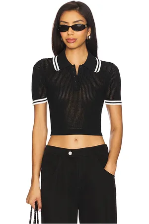 REVOLVE Lovers and Friends Lovers and friends orsola short sleeve polo en color talla L en - Black. Talla L (también en M, S, XL, XS).