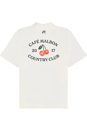 REVOLVE Malbon Golf Malbon golf x cafe du malbon polo en color talla L en - White. Talla L (también en M, S, XL/1X).
