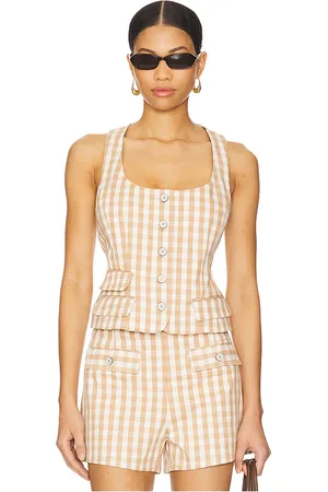 REVOLVE Cinq a Sept Cinq a sept top sin mangas lovina en color bronce talla L en - Tan. Talla L (también en M, S, XS).