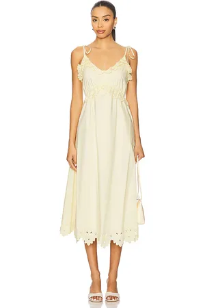 REVOLVE ASTR the Label Astr the label falda midi lissette en color amarillo limon talla L en - Lemon. Talla L (también en M, S, XL, XS).