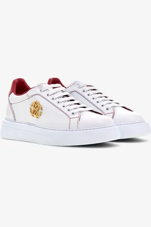 Roberto Cavalli Zapatillas de cuero con emblema dorado