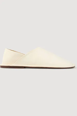 Sandro Slippers de cuero granulado