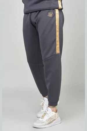 SikSilk Jogger de cinta dorada M