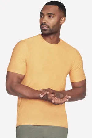 Skechers GO DRI All Day camiseta en /Amarillo, talla Pequeña