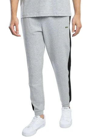 Lacoste Pantalón chandal Pantalones deportivos con bloques de color y corte cónico para hombre