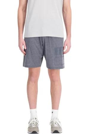New Balance Pantalón pirata MS33073-BKH para hombre