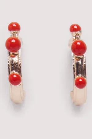 Springfield Pendientes bolitas rojas