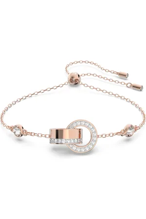 Swarovski Pulsera Dextera, Bucle entrelazado, Blanca, Baño tono oro rosa