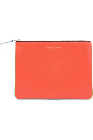 Comme des Garçons Clutch de piel fluorescente