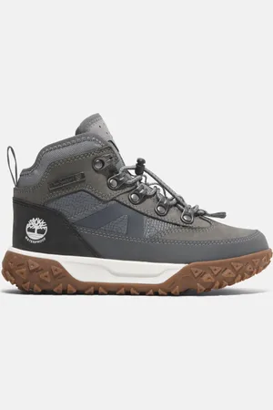 Timberland Botas de montaña de caña media impermeables con cordones elásticos GreenStride Motion 6 para niño (de 30