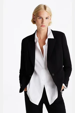 Tommy Hilfiger Americana de botonadura sencilla y corte slim
