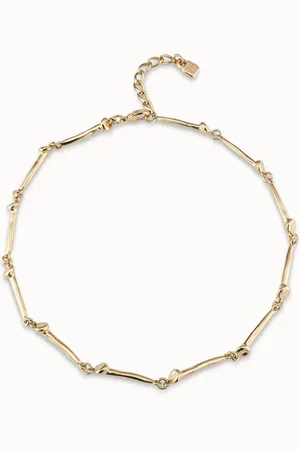 UNO de 50 Collar bañado en oro de 18k con piezas en forma de clavo.