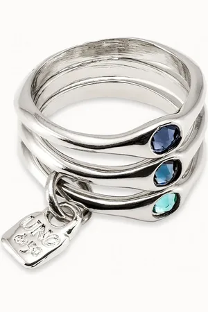 UNO de 50 Anillo triple bañado en plata de ley con cristales azules.