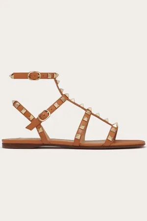 VALENTINO GARAVANI SANDALIAS PLANAS ROCKSTUD DE PIEL DE BECERRO CON TIRAS Mujer 35.5