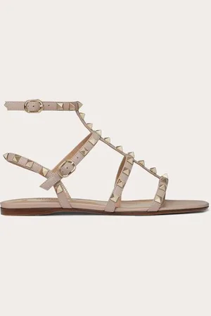 VALENTINO GARAVANI SANDALIAS PLANAS ROCKSTUD DE PIEL DE BECERRO CON TIRAS Mujer 34.5