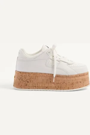 VALENTINO GARAVANI ZAPATILLAS DEPORTIVAS FREEDOTS XL DE CUERO DE BECERRO Y CORCHO Mujer 35.5
