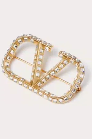 VALENTINO GARAVANI BROCHE DE METAL CON CRISTALES SWAROVSKI® Y EL VLOGO SIGNATURE Mujer UNI