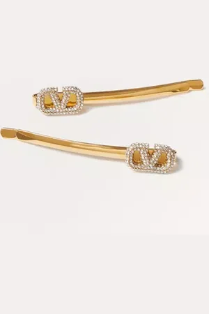 VALENTINO GARAVANI PINZA PARA EL CABELLO DE METAL Y CRISTALES SWAROVSKI® CON EL VLOGO SIGNATURE Mujer UNI