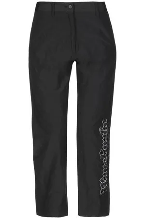 MARCELO BURLON PARTES DE ABAJO - Pantalones
