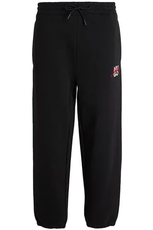 HUGO BOSS PARTES DE ABAJO - Pantalones