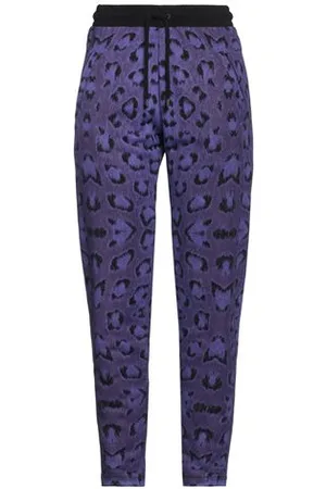 MARCELO BURLON PARTES DE ABAJO - Pantalones