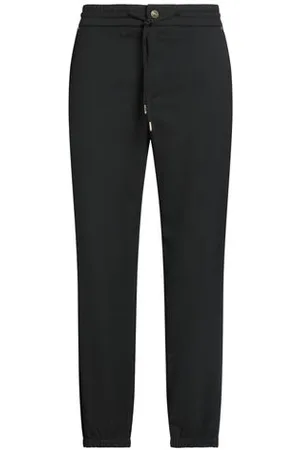 VERSACE PARTES DE ABAJO - Pantalones