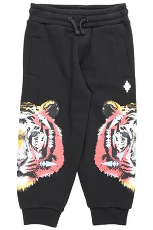 MARCELO BURLON PARTES DE ABAJO - Pantalones