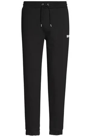 HUGO BOSS PARTES DE ABAJO - Pantalones