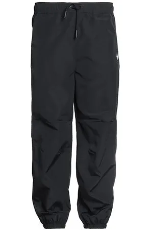 MARCELO BURLON PARTES DE ABAJO - Pantalones