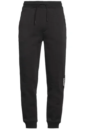 HUGO BOSS PARTES DE ABAJO - Pantalones