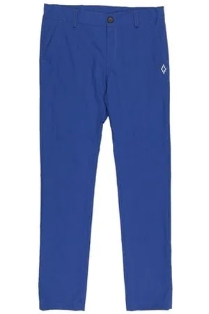 MARCELO BURLON PARTES DE ABAJO - Pantalones