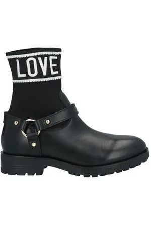 Moschino CALZADO - Botines de caña alta