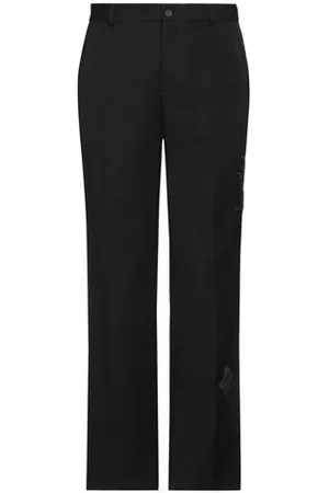 OFF-WHITE PARTES DE ABAJO - Pantalones