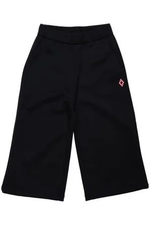 MARCELO BURLON PARTES DE ABAJO - Pantalones