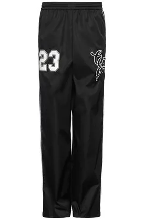OFF-WHITE PARTES DE ABAJO - Pantalones