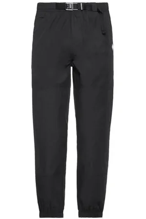 MARCELO BURLON PARTES DE ABAJO - Pantalones
