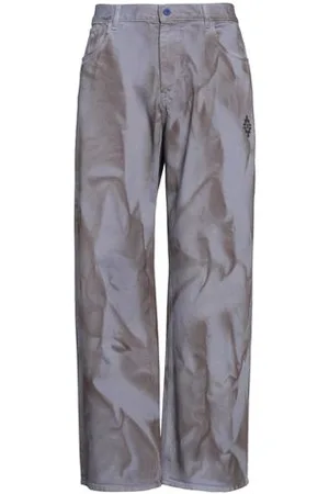 MARCELO BURLON PARTES DE ABAJO - Pantalones