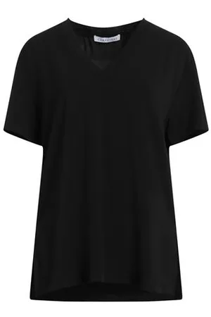 Caractere CAMISETAS Y TOPS - Camisetas