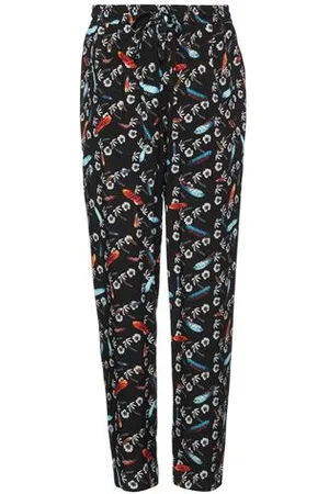 MARCELO BURLON PARTES DE ABAJO - Pantalones
