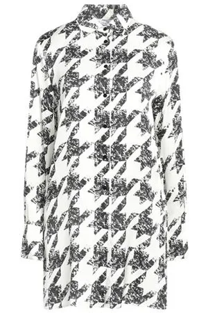 Caractere CAMISETAS Y TOPS - Camisas