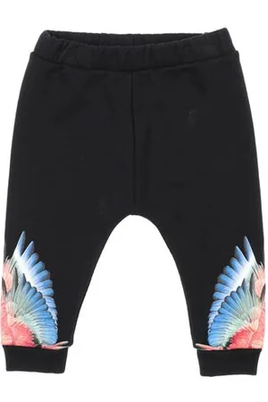 MARCELO BURLON PARTES DE ABAJO - Pantalones