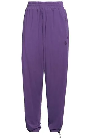 MARCELO BURLON PARTES DE ABAJO - Pantalones