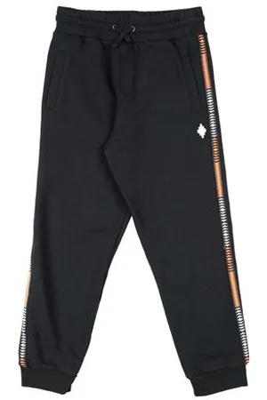 MARCELO BURLON PARTES DE ABAJO - Pantalones