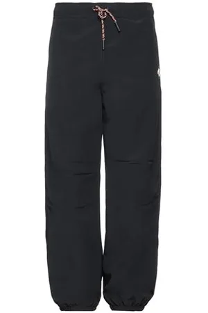 MARCELO BURLON PARTES DE ABAJO - Pantalones