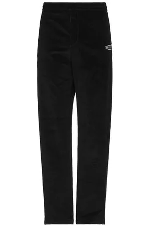 MARCELO BURLON PARTES DE ABAJO - Pantalones